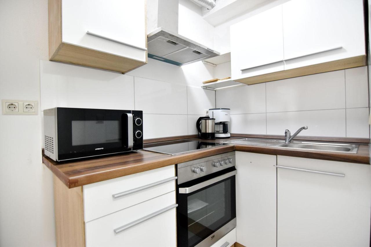 Cozy Worker Apartments Нидеркассель Экстерьер фото